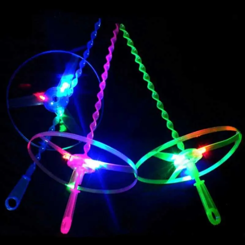 LED Flying Toys 1PCS Illumined Outdoor Fly Disk Toy LED LED Oświetlenie UFO Ręka Push Sporting Good Tricolor Light Holiday Wedding Celebration 240410