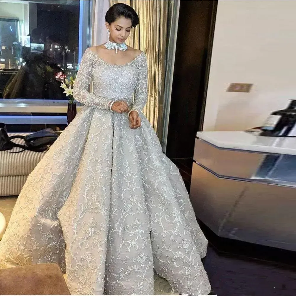 Shining Ball Gown Wedding Dresses Scoop Neck With Long Sleeve Crystal Sequin Bridal Gowns Cascading Ruffles Dubai Vestido De Novia