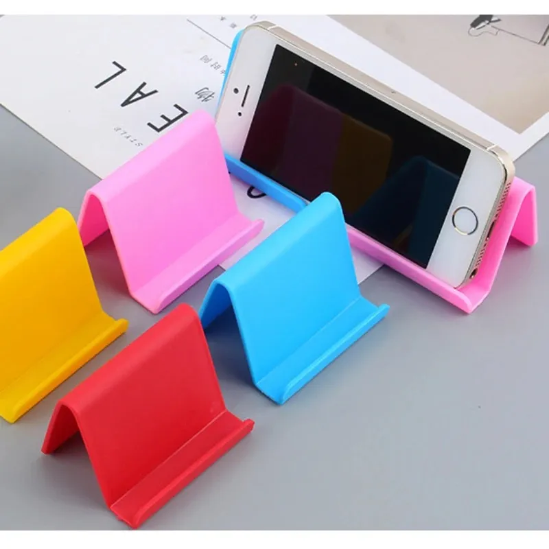 Candy Color Universal Mini Smart Phone Table Desk Mount Stand Telefonhållare Konsol för mobiltelefon Tabletter Lazy Bracket