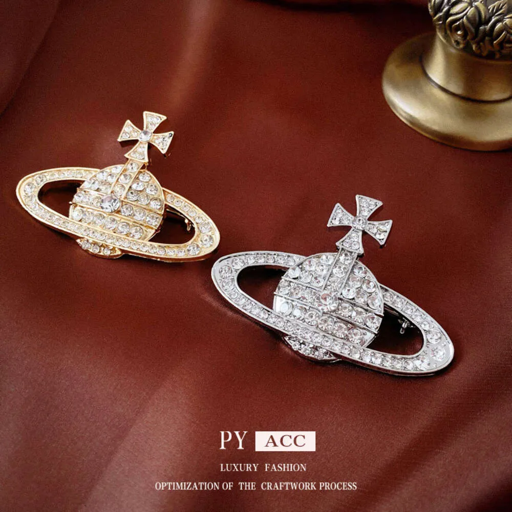 Broche de planète croisée en diamant français, tempérament léger personnalisé, clip de costume, accessoires à la mode et haut de gamme