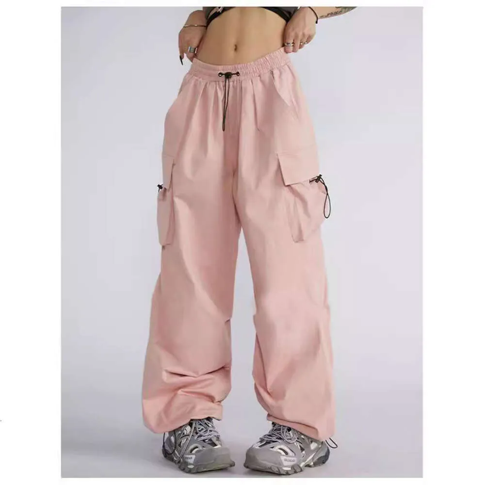 Pantalon à jambe large pour les femmes au printemps et en été Nouveau design Sense Niche chair lâche couvrant les vêtements de travail à tube droit de la rue mince