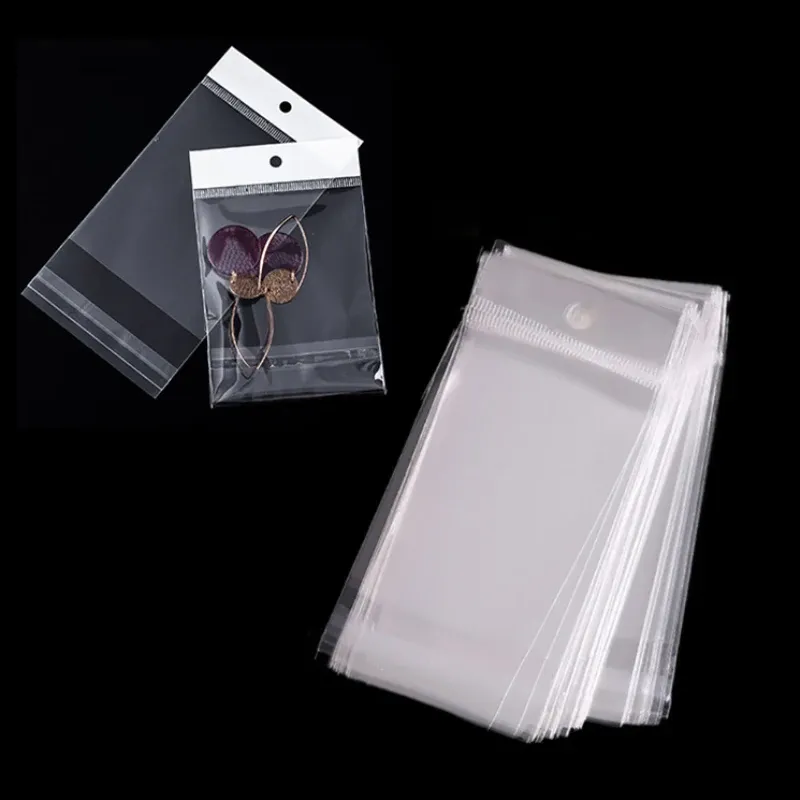 100st Transparent Self Adhesive Opp Bag Plastic Hanging Seal Storage Puches Display Packning Tillbehör för handgjorda smycken