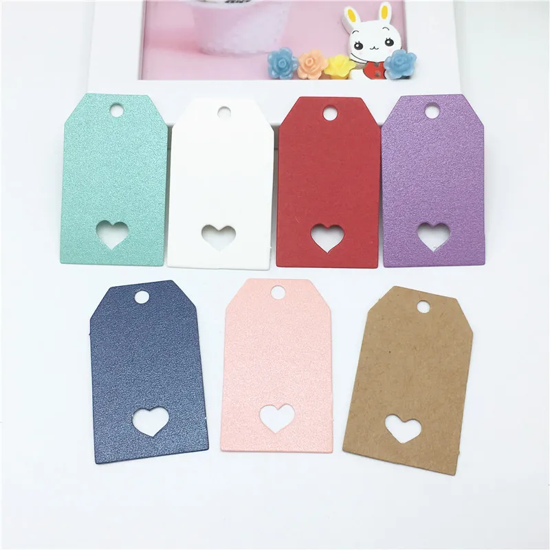 100pcs Emballage Kraft Paper Gift Hang Tag Carte avec coeur creux Paper vierge coloré Lovely Labels Carte 5x3cm