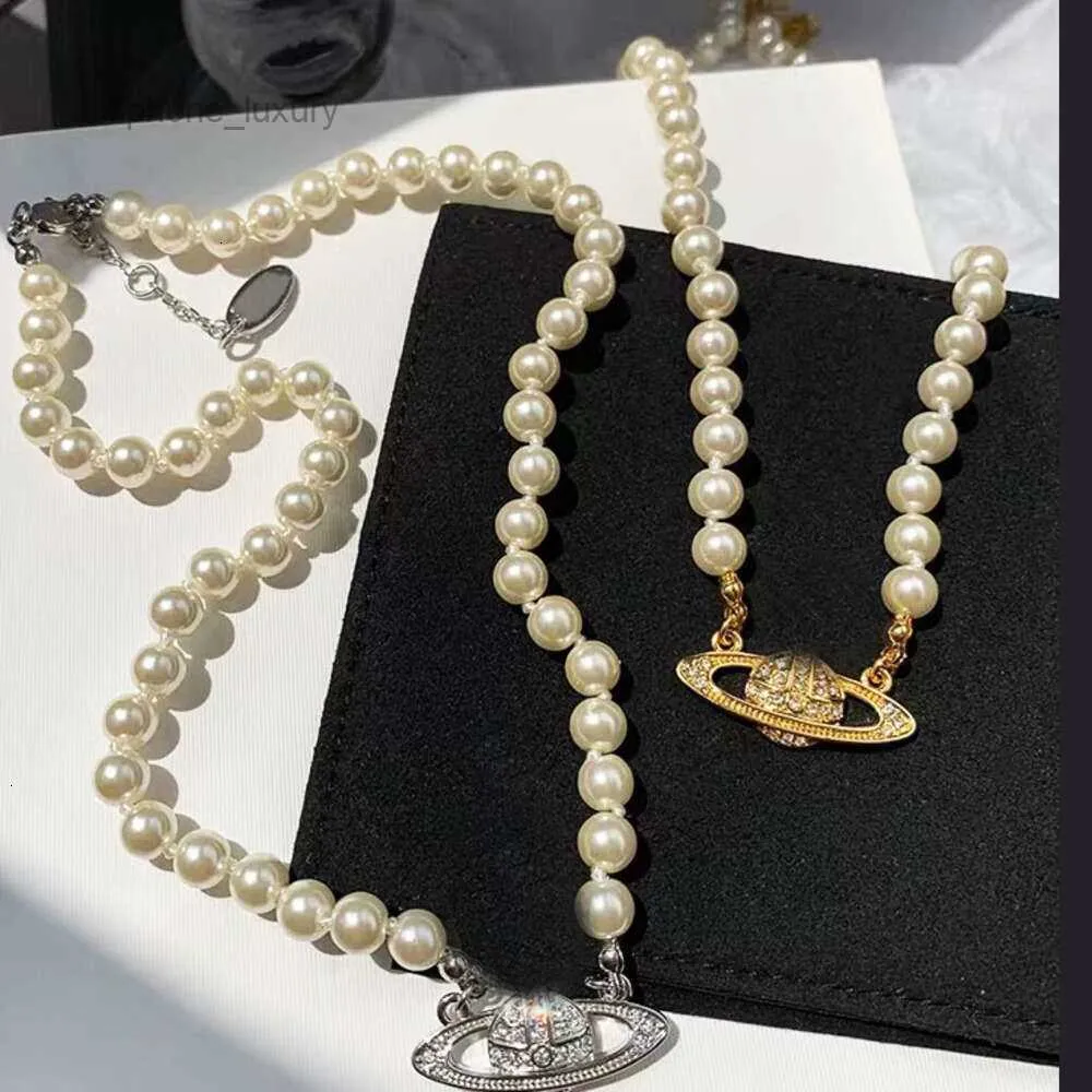 ゴールドシアペンダント土星ネックレスホワイトパールデザイナー女性ネックレスのためのジュエリーファッション1列ビーズ16ichの長さの有名