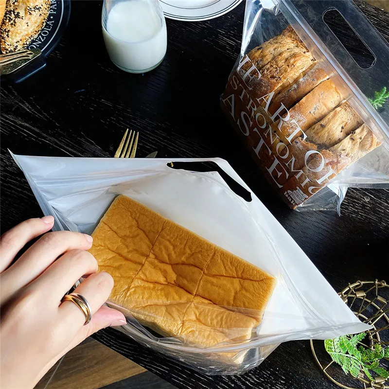 Lbsisi Leben 50pcs/Los transparent geschnittene Brotplastiktüten mit Griff Keks Süßigkeiten Kekse gebürstete Handrissen -Toast -Verpackung