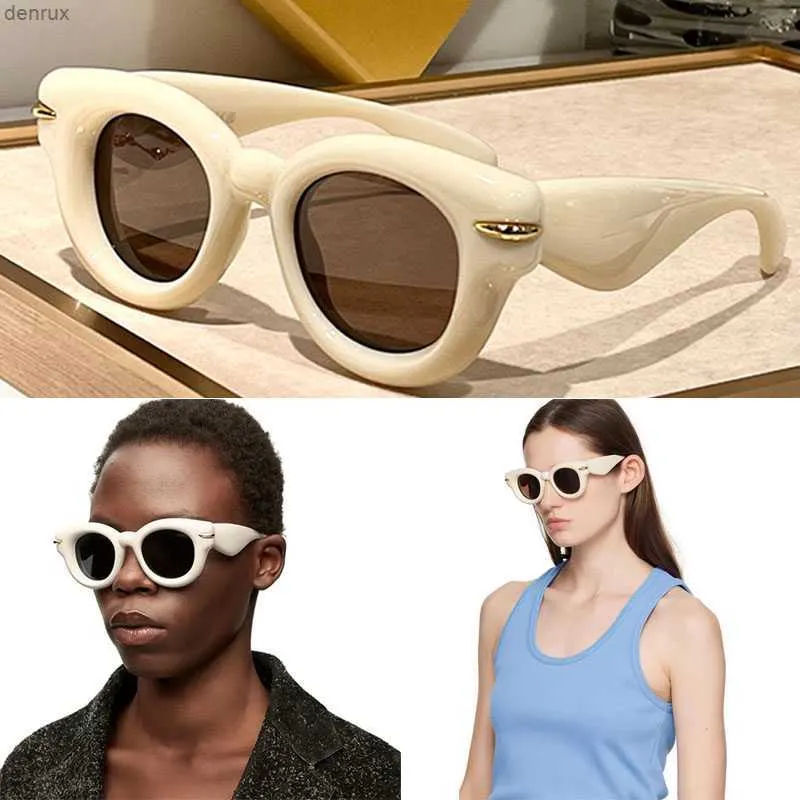 Les lunettes de soleil influencent les lunettes de soleil rondes dans les bras en nylon ornés de décoration en métal doré Temple avec lettre multicolore Hiphop Men et femmes S Glasrai Sola 40118L24