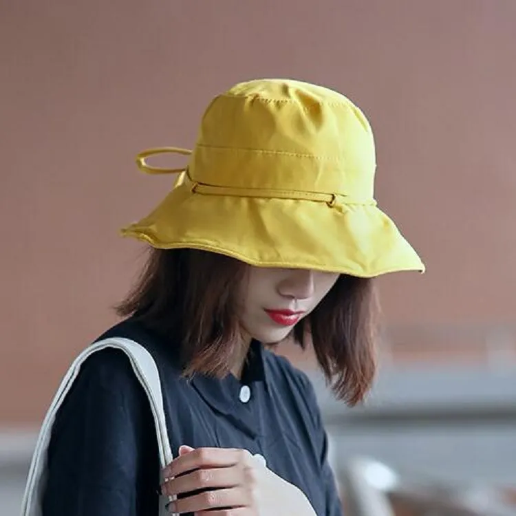 Hatt kvinnors fasta färg fiskare hatt sommar ny stor eaf sun hatt sol hatt fashionabla och avslappnad vikbar skålhatt