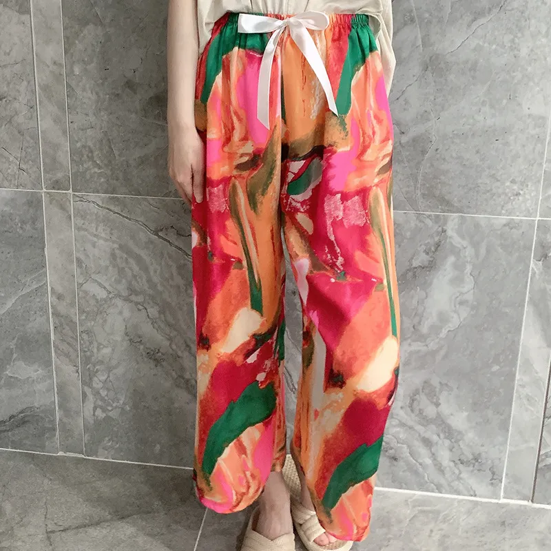 Шелковые женщины пижамные брюки летние весенние брюки, дамы, домашние брюки тонкие цветочные припечатки атласная шлифовальная одежда для самок 2024