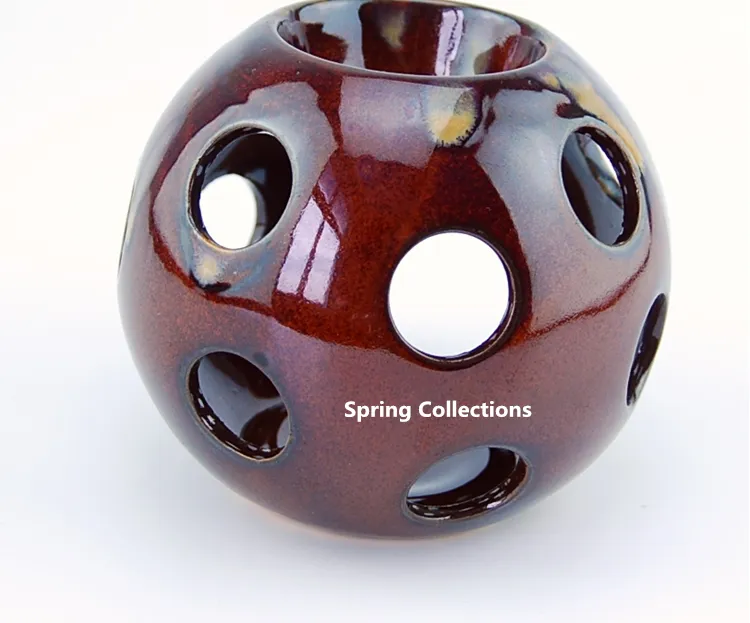10*11 cm Bellissimi lampade ad olio essenziale in ceramica Round Hollow Pattern Simple Essential Fragrance Tea Cancile Porta