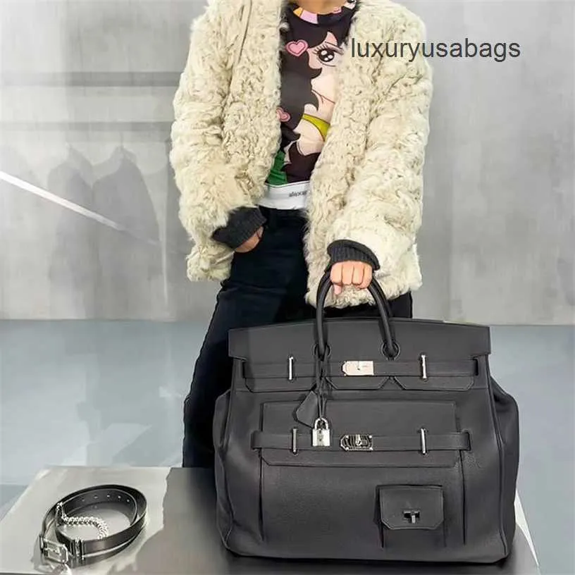 Designer handväskor 50 cm totes väskor nytt litchi mönster extra stor väska unisex affärsresa bagage väska stor kapacitet handhållen väska tidvatten wn-kfd0
