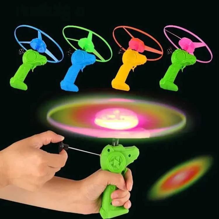 LED Flying Toys Lustiger Dinosaurier spinnen leuchtend Pull Wire UFO Light Griff Flash für Kinder im Freien Spiel 1PC zufällige Farbe 240411