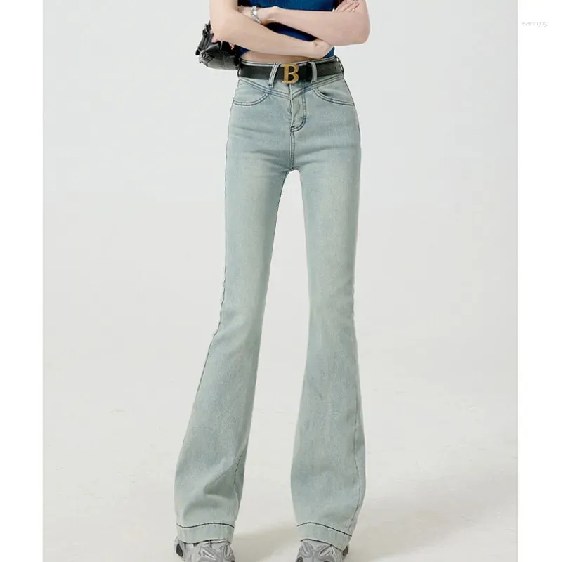 Kvinnors jeans vår och sommar skarvad knapp blixtlås fashionbar fast färg smal passform mångsidig micro blossed