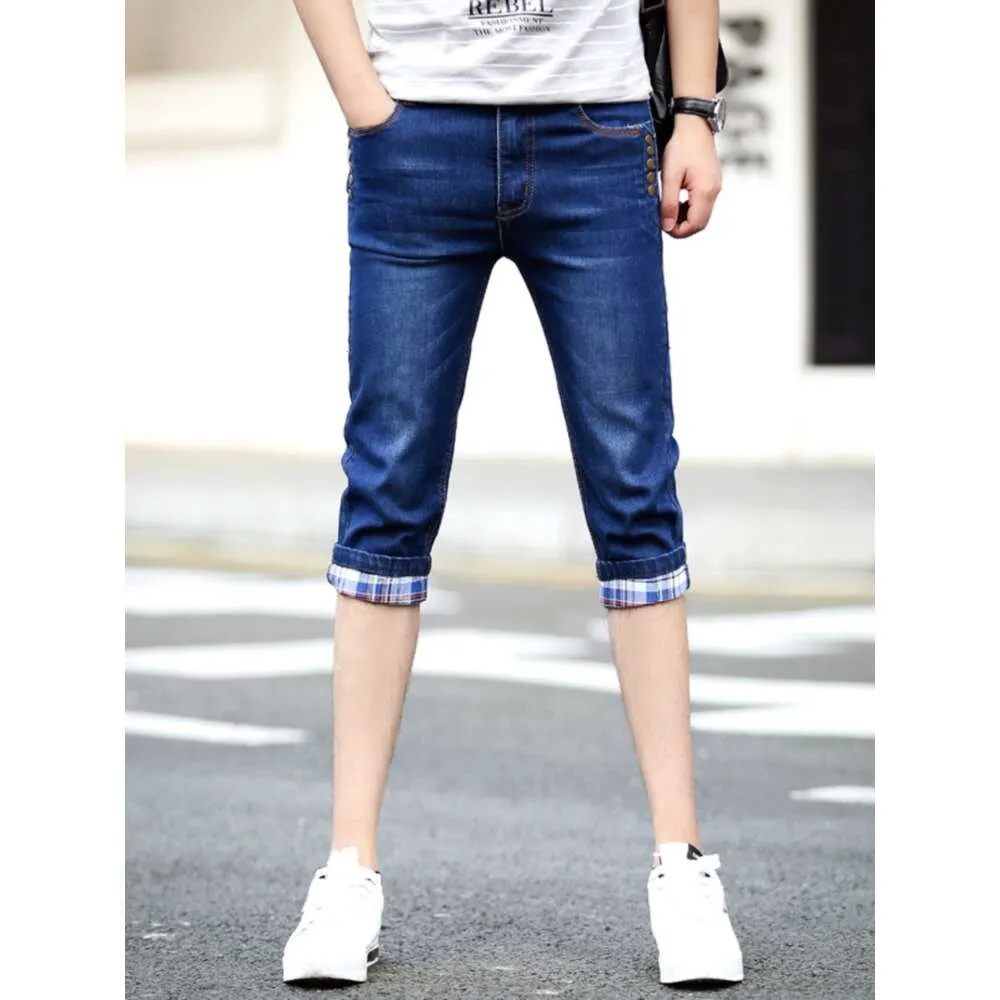 Letnie dżinsy dla męskiej wersji koreańskiej modne cienkie spodnie od średniej do krótkich z małymi nogami, letnie męskie spodnie