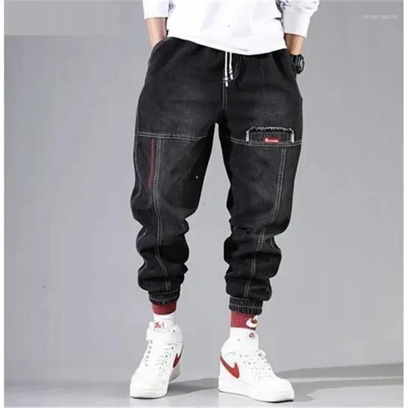 Mäns jeans koreanska mode fotled bandade denim män svart grå lastbyxor för elastisk baggy harem streetwear hiphop