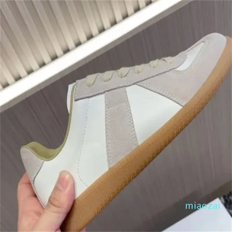 Designerschuhe Repliking mm ausschneiden lässige Schuhe lässige Maison -Herren -Trainer Orangen Zapatos weiß