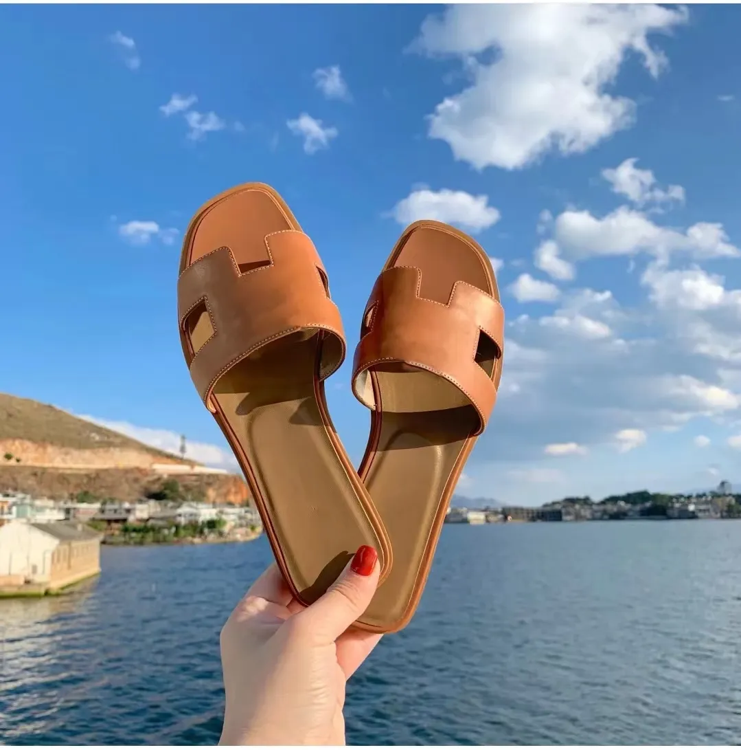 Designer läder non-halp strand tofflor kvinnors flip-flops sandaler hög kvalitet casual skor lyx sommar läder