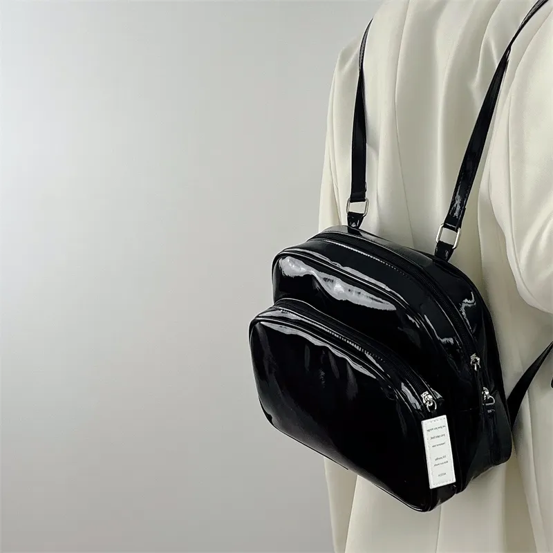 Chic Mini Backpack: Patent Leather Shoulder Bag for Women  display picture 3