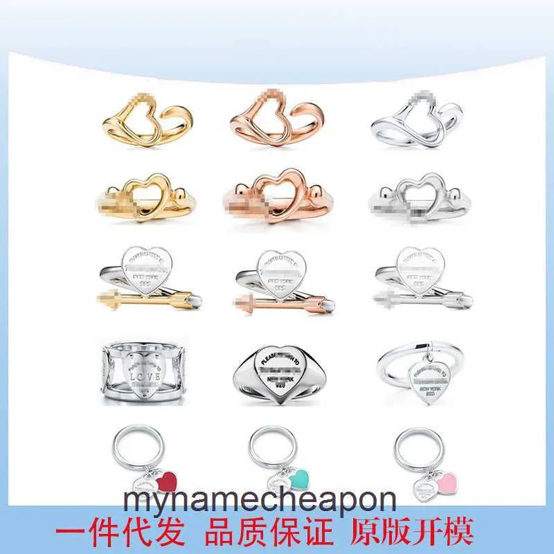 Anneaux de concepteur de haut niveau pour femmes Tifancy S925 Version élevée Hollow Love Heart Arrow Dropping Glue Love Hot Couple Ring Original 1: 1 avec un vrai logo