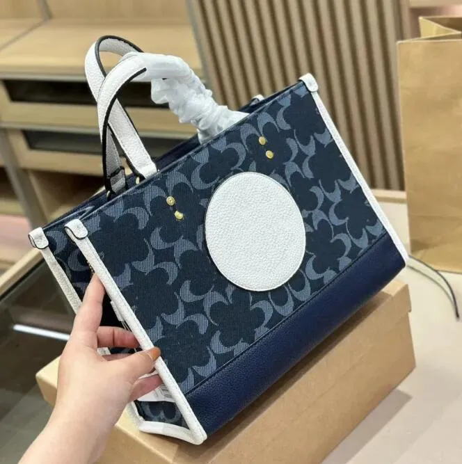 Luxurys Handtas Dempsey Tote Designer Tas voor vrouw Field Sacoche Pochette Shop Heren Canvas Leer Weeksender Ca Coh Schouder Purse Gym Koppeling Crossbody Tassen