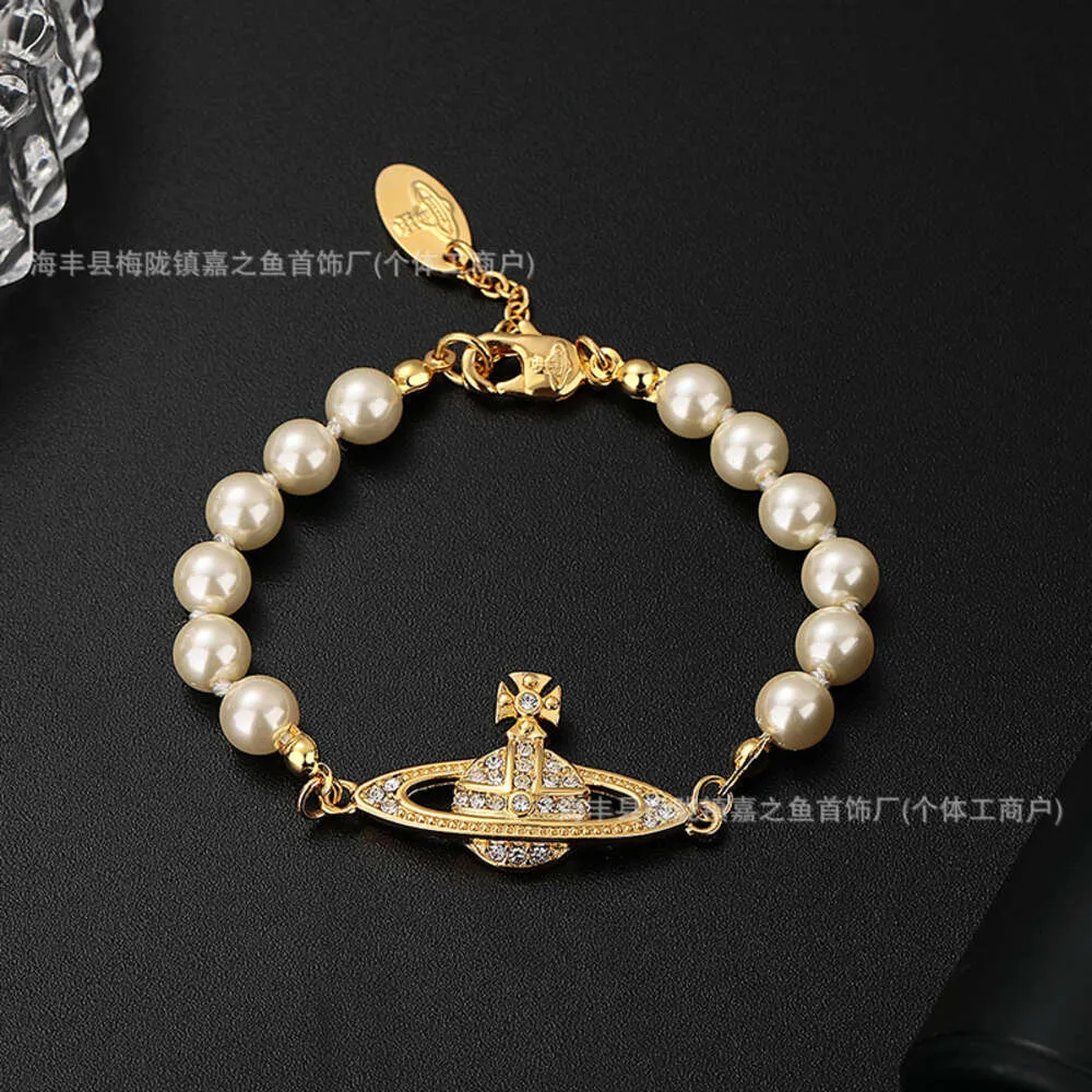 Bracelet de haute version de haute version Classic Empress Dowager Saturn avec diamant incrustation légère tendance féminine en direct femelle streaming