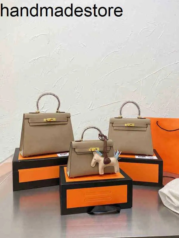 Kl Designer Handbags Leather Women Togo Pattern Imported Cowhide One Shoulder Cross Carrying Portable Platinum Bridal