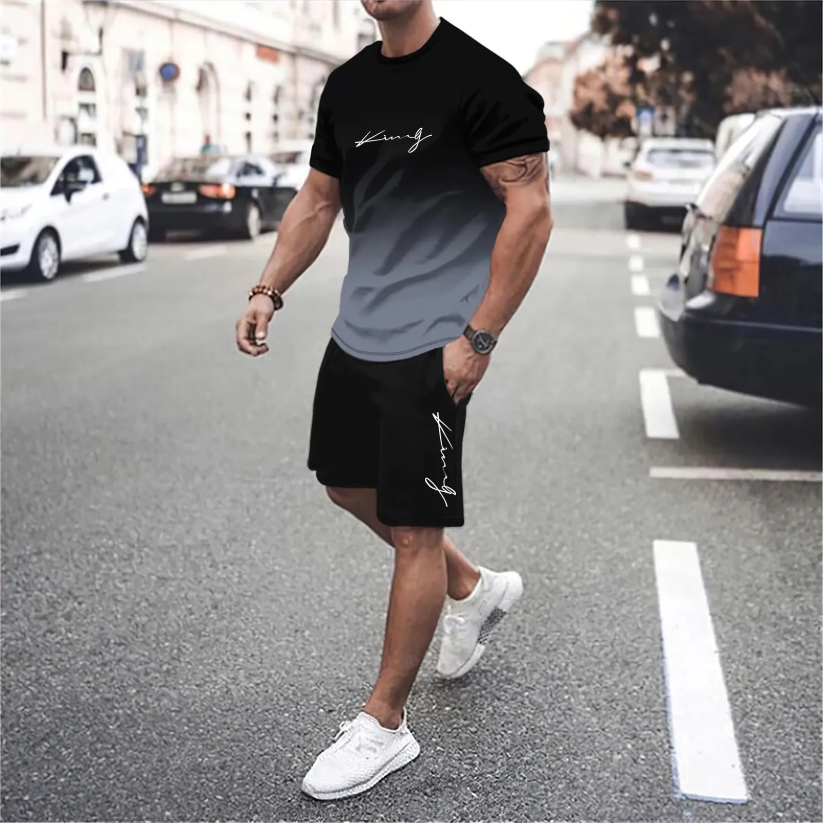 Le dernier Tshirt et shorts de gradient 3D ensembles pour hommes à manches courtes à manches courtes et à la mode.