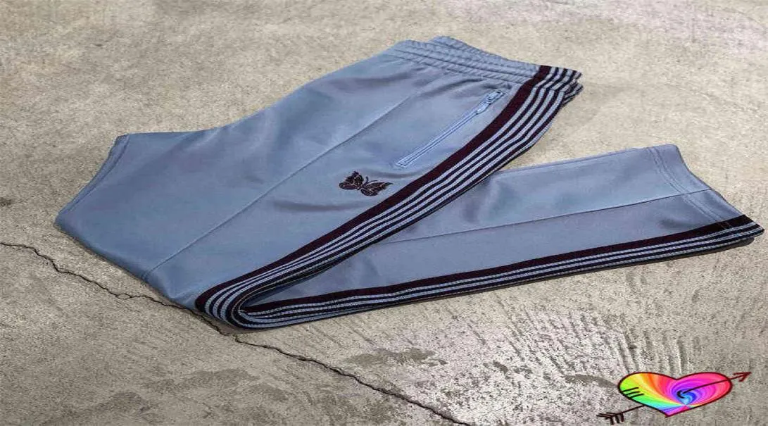 2022 Blue Needles Pants Män kvinnor Högkvalitativa brunt bandet Stripe Embroidery Butterfly Needles Track Pants Awge byxor T2208034380663