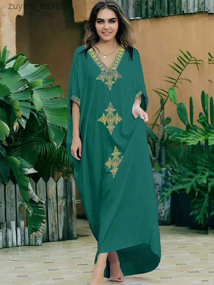 Grundläggande casual klänningar 2024 Elegant guld broderad kaftan retro v-ringning klänning för kvinnor kläder sommarlovstrand slitage maxi klänningar q1373 l49