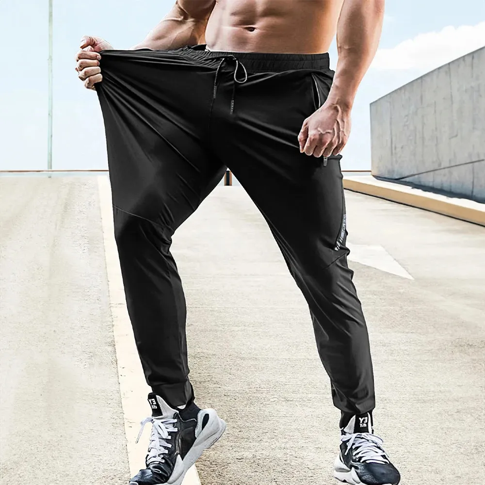 Zomer stretch Men Trackbroeken Casual kleding Elastische taille Jogging Mens Outdoor Training Fitness Adem lang 240411