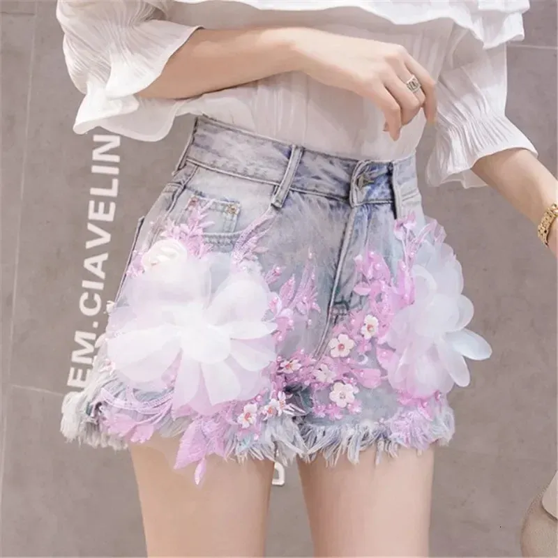 Trend di moda delle donne estive corta jeans ad alta vita gamba larga fiori pesanti fiori femminile shorts shorts buco casual cowboy 240411