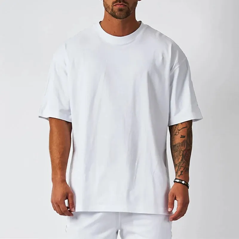 Top pour hommes vierges blancs surdimensionnés surdimensionnés couleur unie solide grande taille Fashion Fashion Short Sleeve 240403