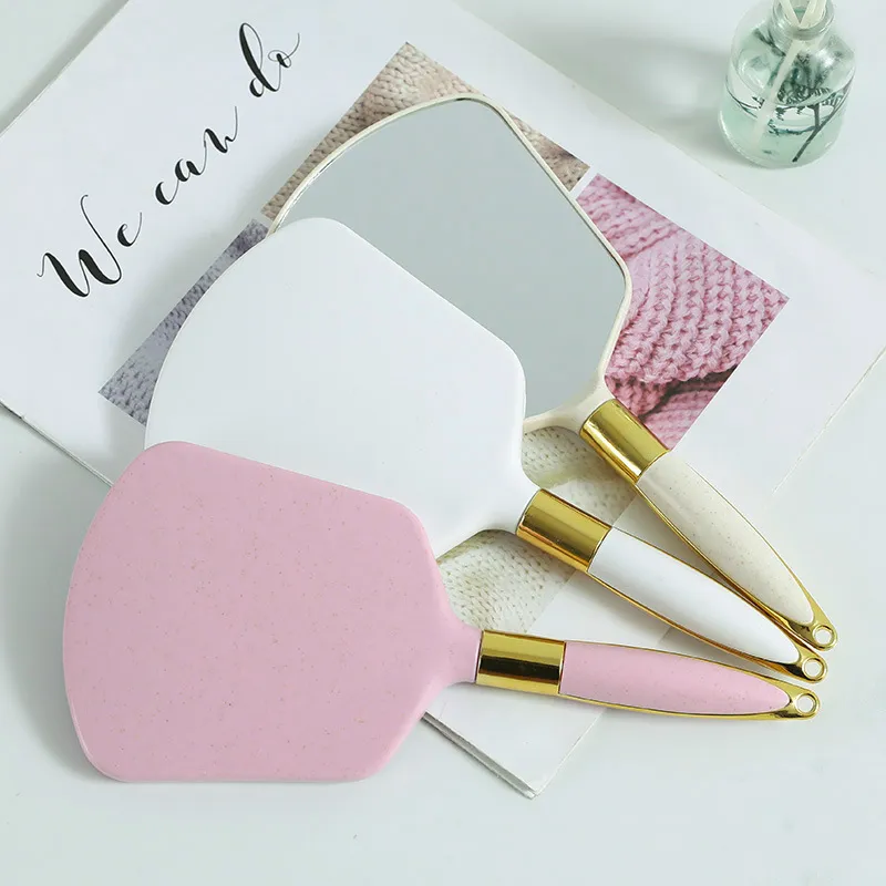 Tshou09 Hand Kead Cosmetic Mirror avec poignée pour cadeaux Plastique rose blanc Miroir de main de main vintage en plastique rose miroir de maquillage