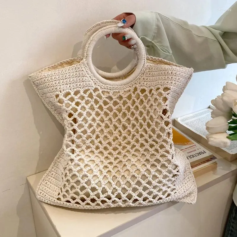 Torby wieczorowe projektowanie mody wydrążone tkane torba 2024 Letnie proste ręczne zakupy