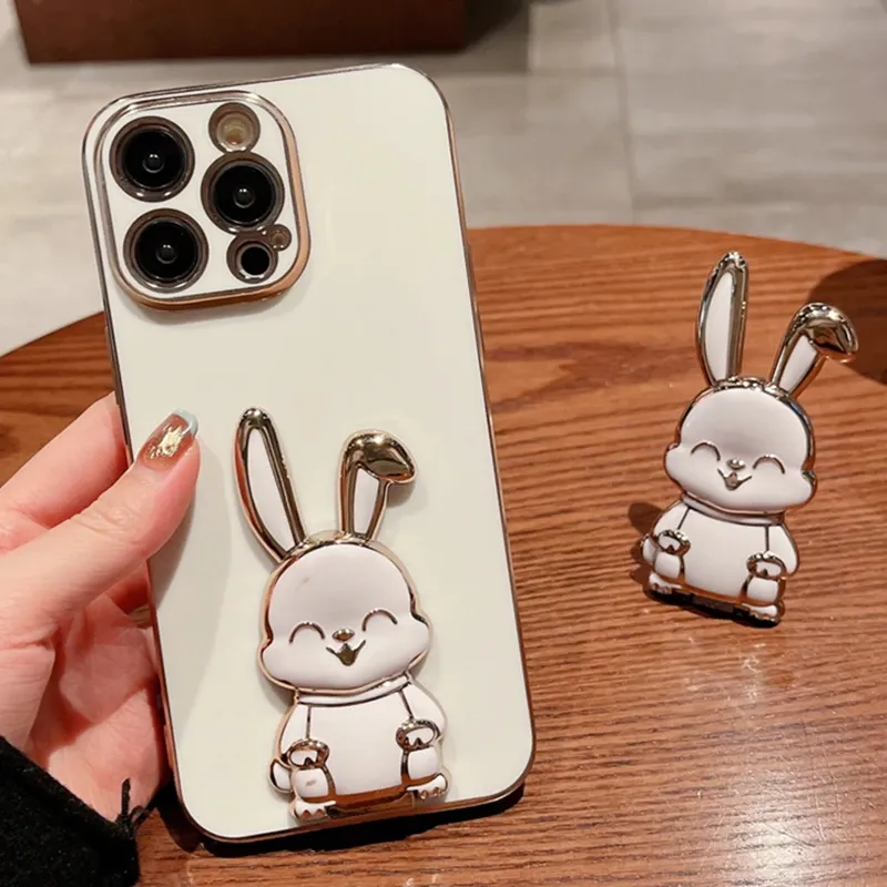 Luxury Plating Frame Rabbit Holder Telefonfodral för iPhone 11 12 13 14 15 Pro Max X XR Soft stockproof på 7 8 14 Plus Stand Cover