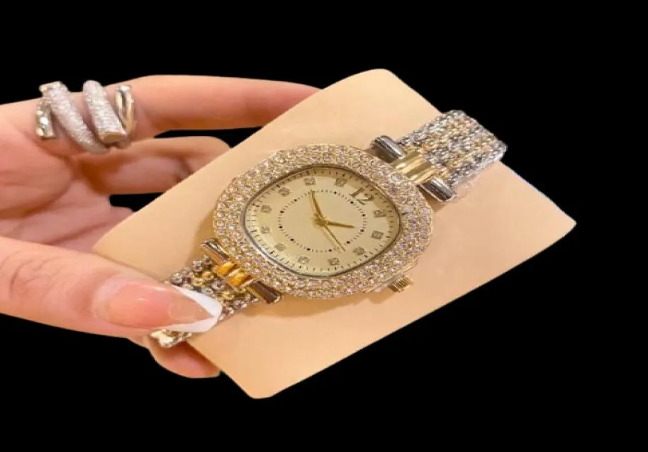 Moda luksusowe złoto zegarki dla kobiet zegarki damskie damskie na rękę ze stali nierdzewnej mrożone diamenty słynne marki bransoletki clock9110274