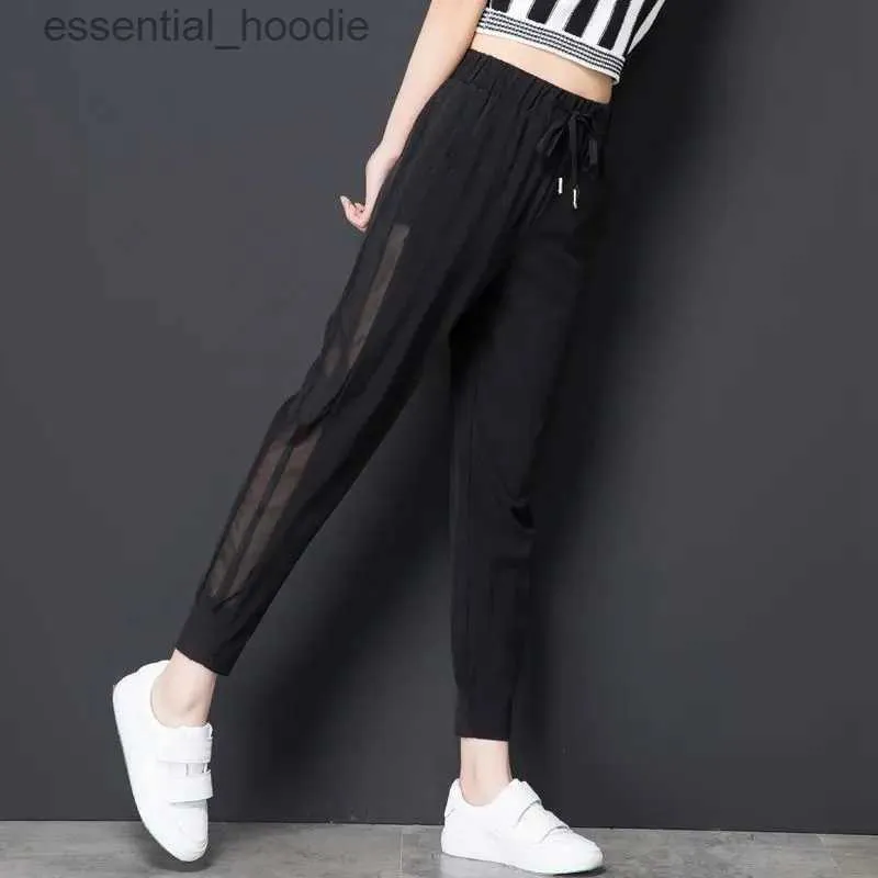 سروال نسائي Capris Summer Mesh Cut Sports Pants 2023 High Weist Lace Thin Korean Edition Loose Disual Wrap Womens Hare Pants C240411