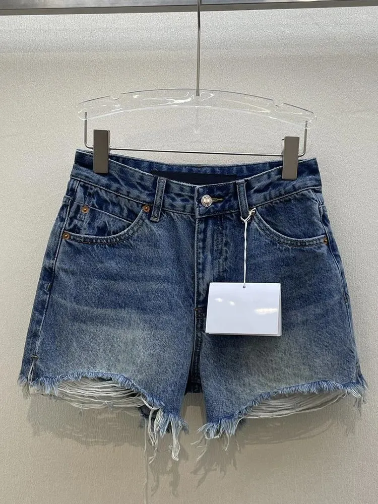 Shorts Shorts Fashion Denim Tasella Design a buco spezzato Design in alto in vita American Streetwear Wrap Hip Short Jeans Summer 2024 Ax64