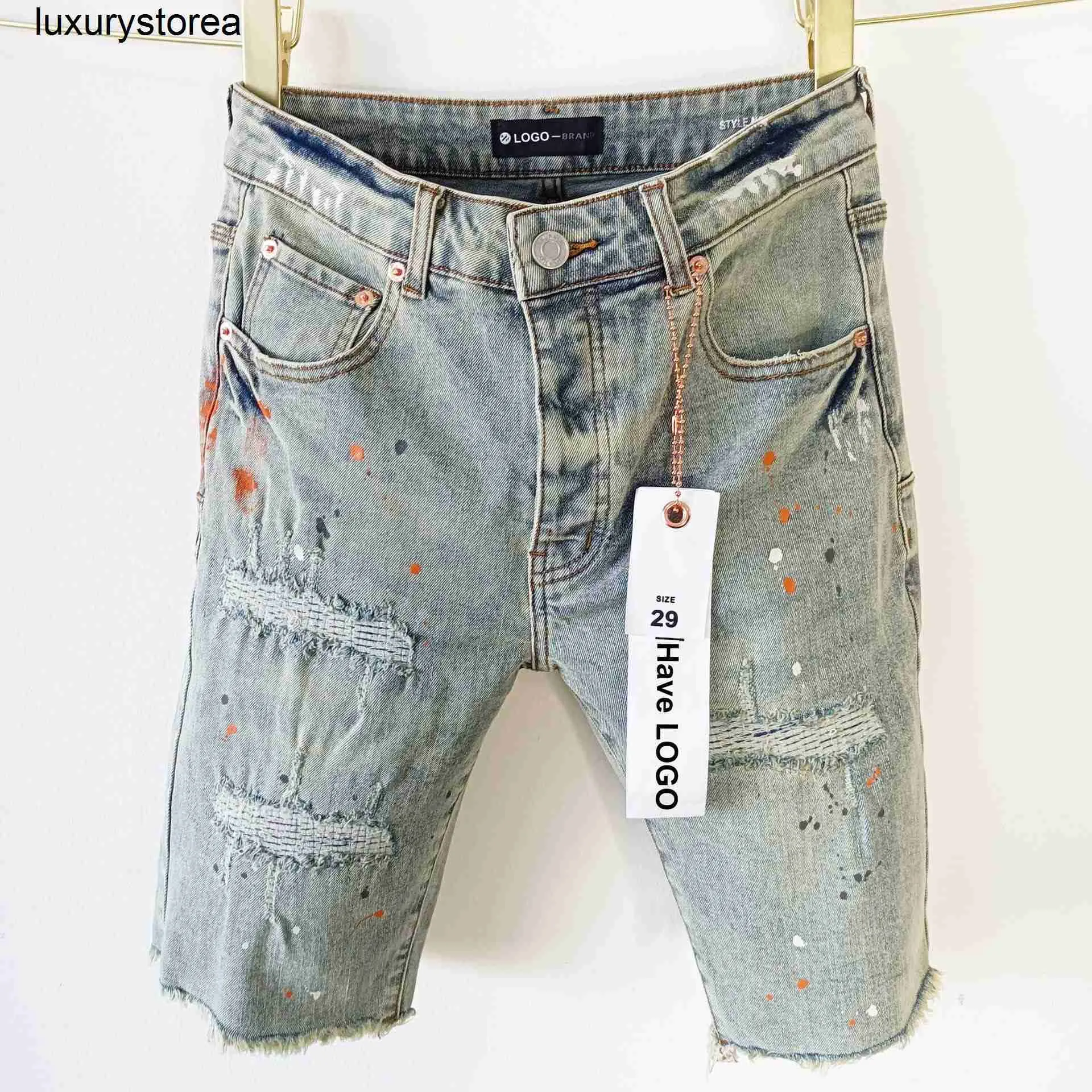 Purple brand denim shorts with American burr edges and holes washed yellow mud denim shorts