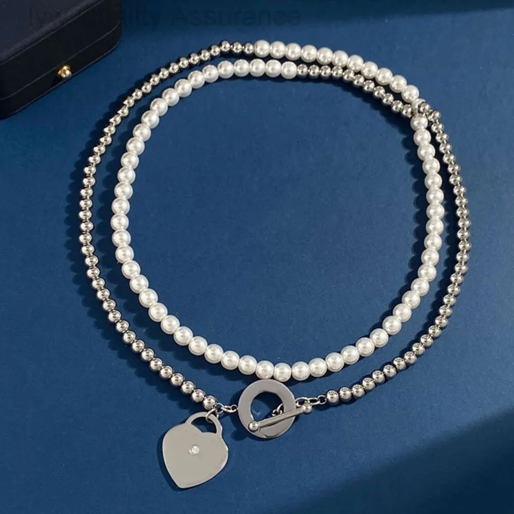 Colar de grife para mulher Tiffanybead Colar Charm Luxury Pérola Jóias de Jóias de Jóias de Aço Antelhado Coração de Coloque de Fivela OT