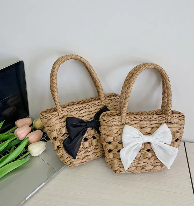 Children hollow paper rope weaving handbags girls Bows applique hand bags kids beach holiday vegetable basket Z7637