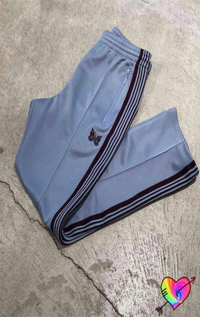 2022 Blue Needles Pants Män Kvinnor Högkvalitativa brunt bandet Stripe Embroidery Butterfly Needles Track Pants Awge byxor T2208035635931