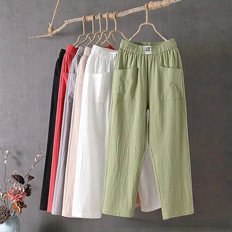 Pantaloni harem in lino di cotone casual estivo donne di grandi dimensioni larghi alti elastici elastici pantaloni tascabili solidi 240411