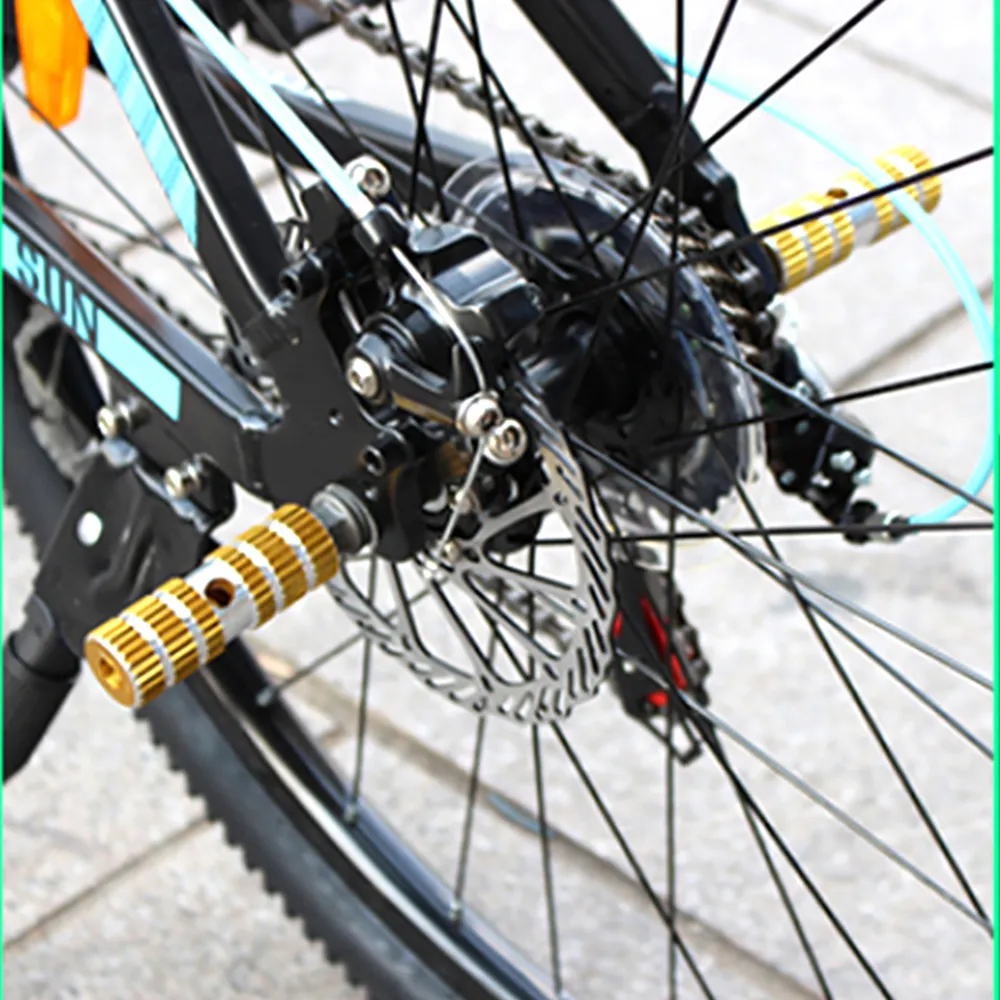 1 paio di pedali per bici a riposo dell'asse PEGS in lega di alluminio anti-slip BMX Mountain Road Cycling Bicycle Posuto posteriore anteriore