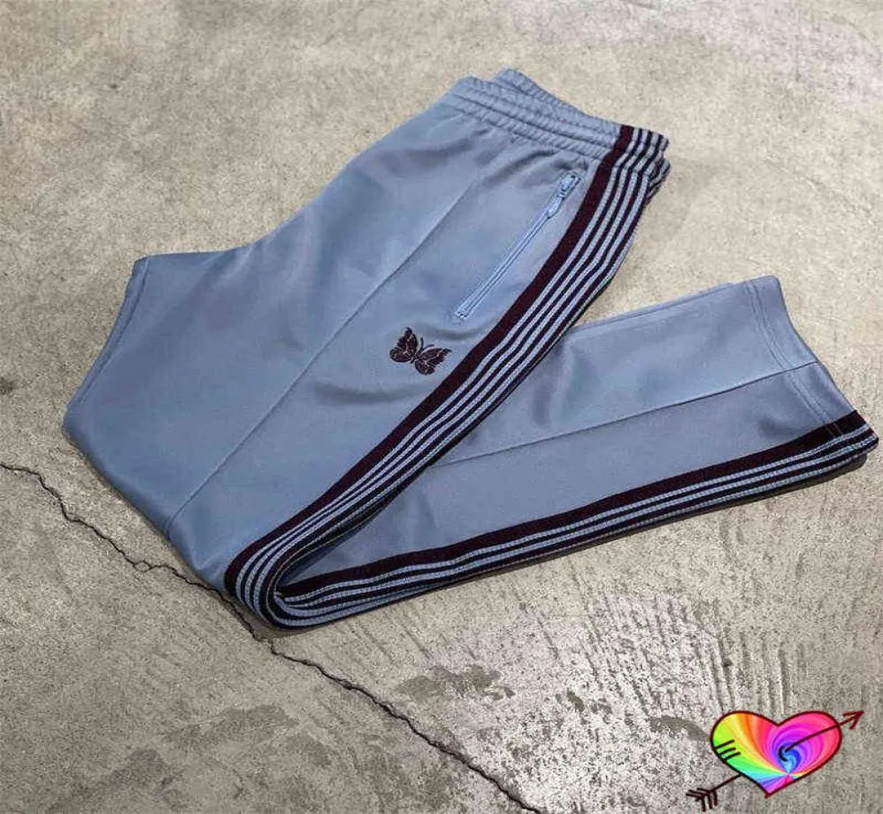 2022 Blue Needles Pants Män Kvinnor Högkvalitativa brunt bandet Stripe Embroidery Butterfly Needles Track Pants Awge Byxor T2208039804267