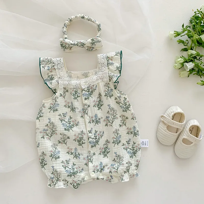 Milancel Nieuwe zomerbabymeisjes Rompelt een-stuk peuter zoete groene bloemen jumpsuit met haarband baby-outfits