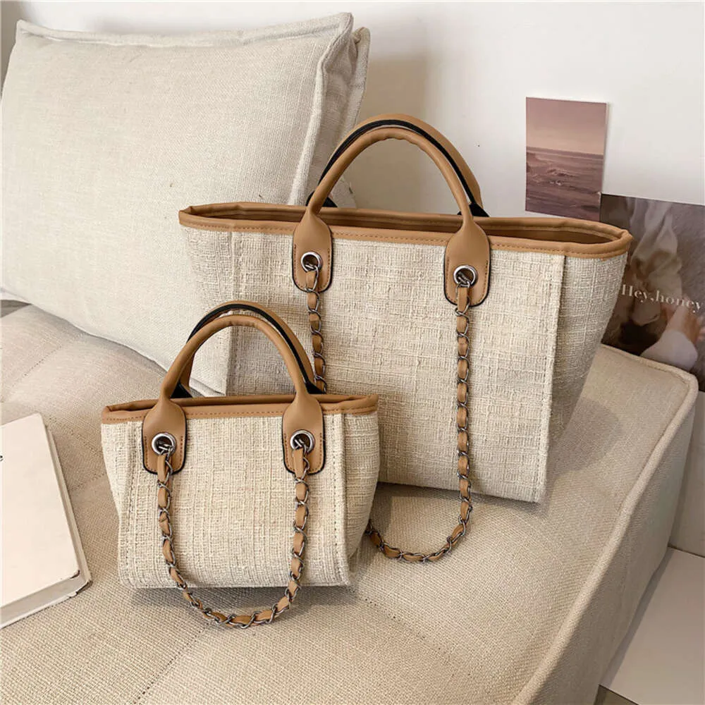 Xiaoxiangfeng Canvas Frauenfarbkette Crossbody Handheld Traging und kleine Kapazitätsbeutel 78% Rabatt auf den Laden Großhandel