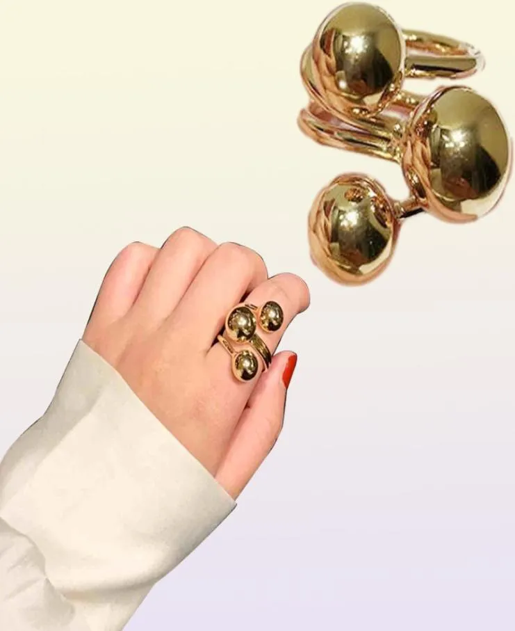 AOMU 2020 Överdrivning Guldfärg Metall Boll Öppen ringar Simple Design Geometriska oregelbundna fingerringar för kvinnor Party SMEEXKE Q076383478
