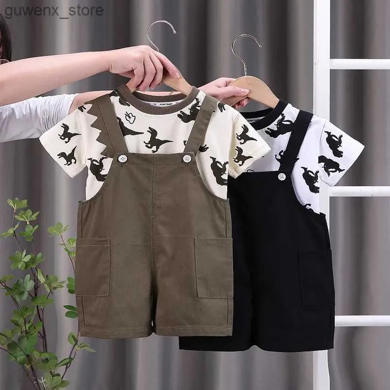 Kläder sätter nya sommar baby pojkar kläder småbarn mode spädbarn barn dinosaurie tryck kläder kostymer solida t -skjorta overaller byxor 2 st/set y240412