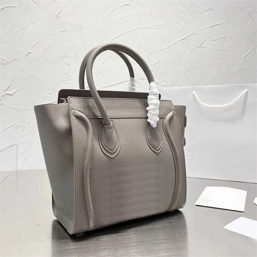 シックなCEクラシックデザイナートートバッグ女性スマイルレザーハンドバッグ最高品質のショルダーバッグレディワンショルダークロスボディバッグ財布220714