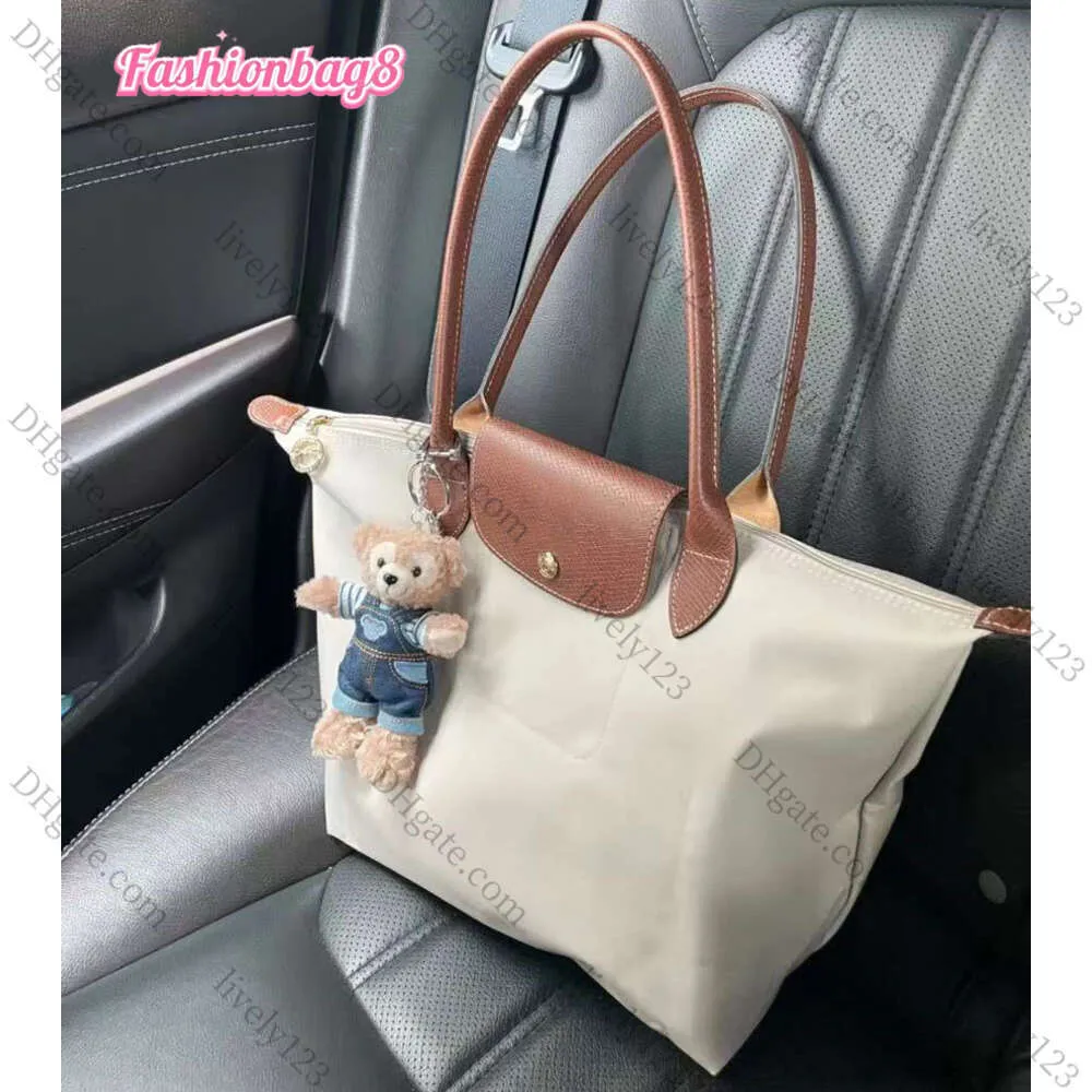 2024 Designer Bag Womens Tote Shoulder European Style Leisure Dumpling Bag Nylon Handbag Crossbody Folding Embroidery Tote Shopping Mini 9025ess